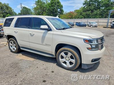 Czwarte zdjęcie samochodu z boku: 2015 CHEVROLET TAHOE C1500 LT VIN:1GNSCBKC2FR501809 - miniatura