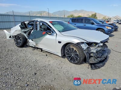 Czwarte zdjęcie samochodu z boku: 2023 LEXUS LS 500H VIN:JTHGYLGF3P5002615 - miniatura
