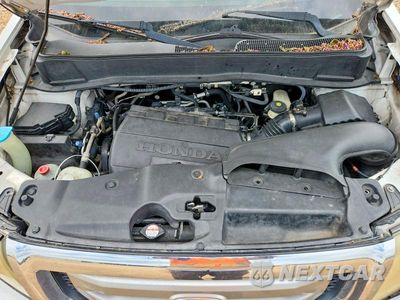 Zdjęcie 12 z 14 samochodu: 2010 HONDA PILOT TOURING VIN:5FNYF3H93AB001295 - miniatura