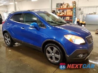 Czwarte zdjęcie samochodu z boku: 2014 BUICK ENCORE CONVENIENCE VIN:KL4CJBSB2EB641015 - miniatura