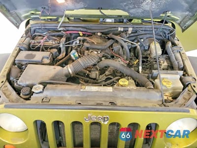 Zdjęcie 11 z 12 samochodu: 2007 JEEP WRANGLER SAHARA VIN:1J4GA59137L118681 - miniatura