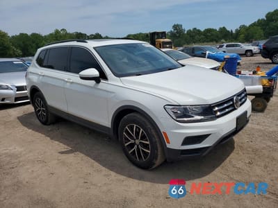Czwarte zdjęcie samochodu z boku: 2021 VOLKSWAGEN TIGUAN SE VIN:3VV2B7AX9MM083827 - miniatura