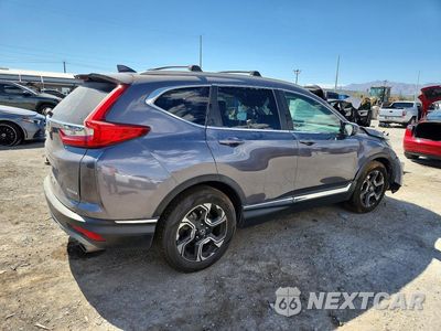 Trzecie zdjęcie samochodu z tyłu: 2019 HONDA CR-V TOURING VIN:7FARW1H95KE001104 - miniatura
