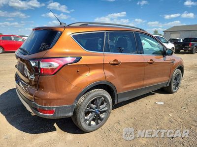 Trzecie zdjęcie samochodu z tyłu: 2017 FORD ESCAPE SE VIN:1FMCU9GD9HUB68251 - miniatura