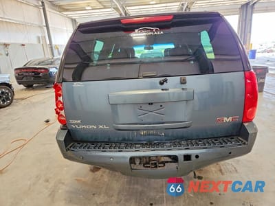 Zdjęcie 6 z 14 samochodu: 2010 GMC YUKON XL K1500 SLT VIN:1GKUKKE32AR259441 - miniatura