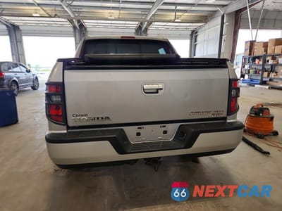 Zdjęcie 6 z 12 samochodu: 2013 HONDA RIDGELINE SPORT VIN:5FPYK1F71DB018898 - miniatura