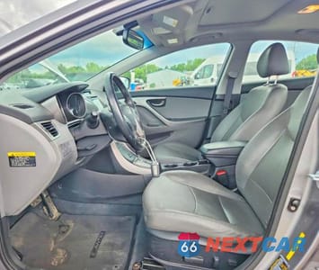 Zdjęcie 7 z 12 samochodu: 2013 HYUNDAI ELANTRA LIMITED VIN:KMHDH4AE7DU635352 - miniatura