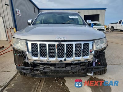 Piąte zdjęcie samochodu w środku: 2012 JEEP GRAND CHEROKEE OVERLAND VIN:1C4RJECG1CC190257 - miniatura