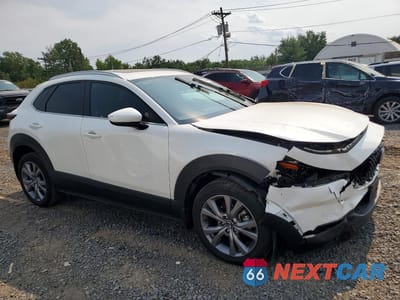 Czwarte zdjęcie samochodu z boku: 2024 MAZDA CX-30 PREFERRED VIN:3MVDMBCMXRM685102 - miniatura