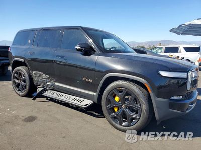 Czwarte zdjęcie samochodu z boku: 2023 RIVIAN R1S ADVENTURE VIN:7PDSGABA8PN010975 - miniatura