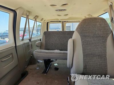 Zdjęcie 10 z 13 samochodu: 2003 FORD ECONOLINE E350 SUPER DUTY WAGON VIN:1FMNE31S73HB17651 - miniatura
