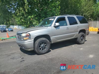 2003 GMC YUKON DENALI 1GKEK63U73J170358 - główne zdjęcie licytacji z USA - miniatura