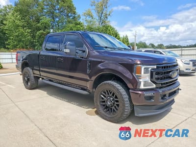 Czwarte zdjęcie samochodu z boku: 2021 FORD F350 SUPER DUTY VIN:1FT8W3BT8MED20122 - miniatura