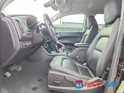 Zdjęcie 7 z 13 samochodu: 2022 GMC CANYON AT4 VIN:1GTG6FEN1N1327917 - miniatura