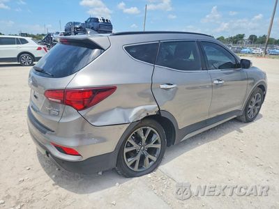 Trzecie zdjęcie samochodu z tyłu: 2017 HYUNDAI SANTA FE SPORT 2.0T ULTIMATE VIN:5XYZW4LA8HG424193 - miniatura