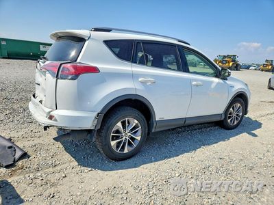 Trzecie zdjęcie samochodu z tyłu: 2018 TOYOTA RAV4 HYBRID LE VIN:JTMRJREVXJD190350 - miniatura
