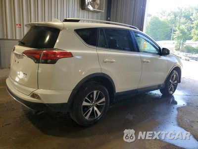 Trzecie zdjęcie samochodu z tyłu: 2017 TOYOTA RAV4 XLE VIN:JTMRFREV0HD200735 - miniatura