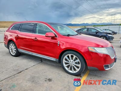 Czwarte zdjęcie samochodu z boku: 2012 LINCOLN MKT VIN:2LMHJ5AT1CBL50665 - miniatura