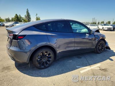 Trzecie zdjęcie samochodu z tyłu: 2021 TESLA MODEL Y VIN:5YJYGDEE6MF159560 - miniatura