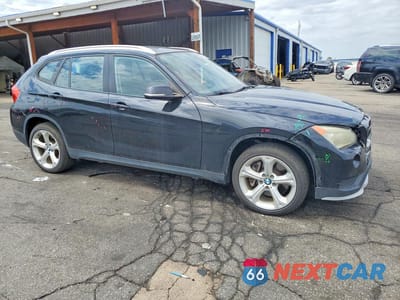 Czwarte zdjęcie samochodu z boku: 2015 BMW X1 XDRIVE35I VIN:WBAVM5C58FVV93629 - miniatura