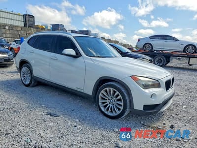 Czwarte zdjęcie samochodu z boku: 2014 BMW X1 SDRIVE28I VIN:WBAVM1C58EVW48667 - miniatura