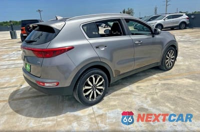 Czwarte zdjęcie samochodu z boku: 2017 KIA SPORTAGE EX VIN:KNDPN3AC5H7215869 - miniatura