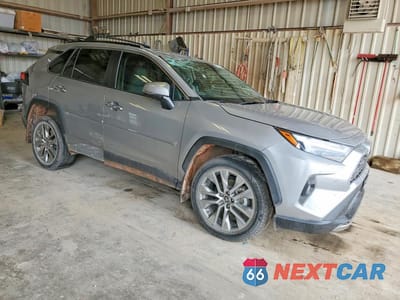 Czwarte zdjęcie samochodu z boku: 2022 TOYOTA RAV4 LIMITED VIN:2T3Y1RFVXNW199715 - miniatura