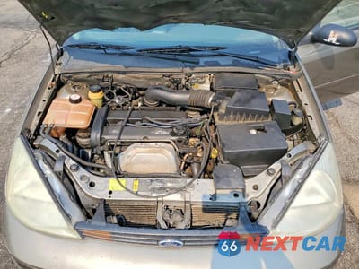 Zdjęcie 11 z 12 samochodu: 2000 FORD FOCUS SE VIN:1FAFP343XYW308478 - miniatura