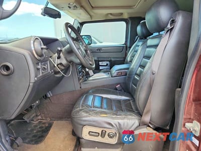Zdjęcie 7 z 13 samochodu: 2006 HUMMER H2 VIN:5GRGN23U86H105260 - miniatura