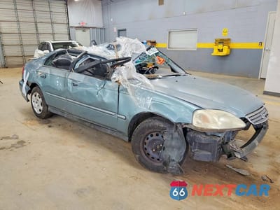 Czwarte zdjęcie samochodu z boku: 1999 HONDA CIVIC EX VIN:1HGEJ8543XL051628 - miniatura