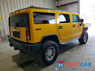 Trzecie zdjęcie samochodu z tyłu: 2003 HUMMER H2 VIN:5GRGN23U83H141588 - miniatura