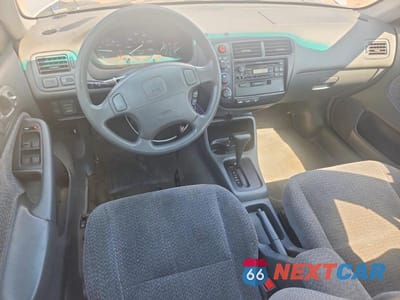 Zdjęcie 8 z 12 samochodu: 1999 HONDA CIVIC EX VIN:1HGEJ8647XL022020 - miniatura