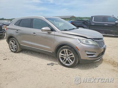 Czwarte zdjęcie samochodu z boku: 2016 LINCOLN MKZ VIN:5LMCH3D93GUH19984 - miniatura
