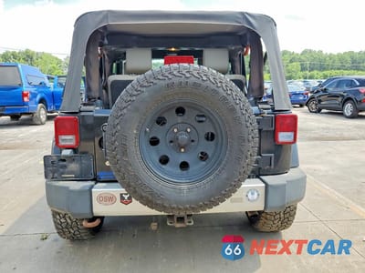 Zdjęcie 6 z 13 samochodu: 2009 JEEP WRANGLER SAHARA VIN:1J4FA54179L700644 - miniatura