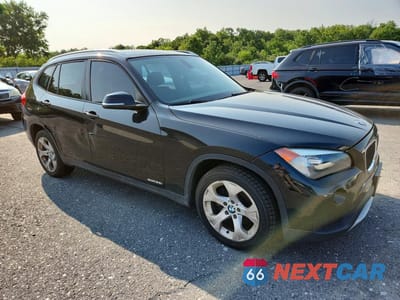 Czwarte zdjęcie samochodu z boku: 2014 BMW X1 SDRIVE28I VIN:WBAVM1C52EVW50298 - miniatura