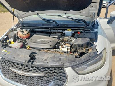 Zdjęcie 12 z 13 samochodu: 2023 CHRYSLER PACIFICA HYBRID TOURING L VIN:2C4RC1L70PR554264 - miniatura