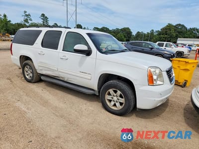 Czwarte zdjęcie samochodu z boku: 2011 GMC YUKON XL C1500 SLT VIN:1GKS1KE08BR205143 - miniatura