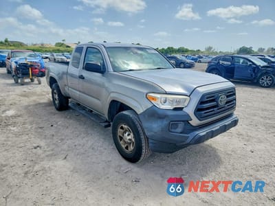 Czwarte zdjęcie samochodu z boku: 2019 TOYOTA TACOMA SR VIN:5TFRX5GN4KX149734 - miniatura