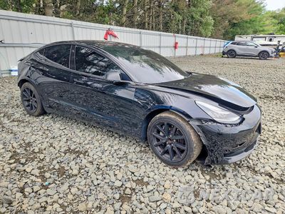Czwarte zdjęcie samochodu z boku: 2018 TESLA MODEL 3 VIN:5YJ3E1EA3JF152184 - miniatura