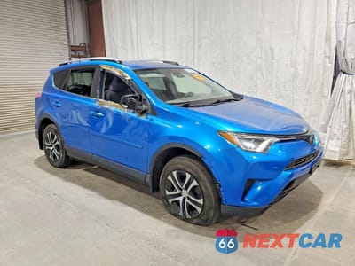 Czwarte zdjęcie samochodu z boku: 2018 TOYOTA RAV4 LE VIN:JTMBFREV8JJ742237 - miniatura