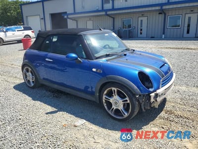 Czwarte zdjęcie samochodu z boku: 2005 MINI COOPER S VIN:WMWRH33415TF80638 - miniatura