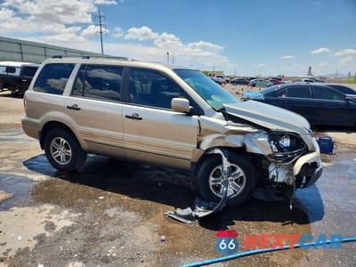 Czwarte zdjęcie samochodu z boku: 2005 HONDA PILOT EX VIN:5FNYF18455B030134 - miniatura