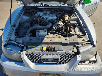 Zdjęcie 11 z 12 samochodu: 2004 FORD MUSTANG VIN:1FAFP44674F229814 - miniatura