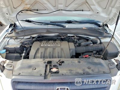 Zdjęcie 12 z 13 samochodu: 2005 HONDA PILOT EXL VIN:2HKYF18625H541917 - miniatura
