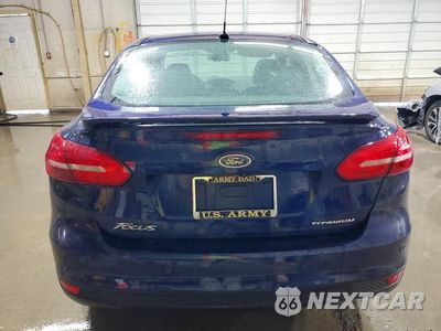 Zdjęcie 6 z 13 samochodu: 2017 FORD FOCUS TITANIUM VIN:1FADP3J24HL209336 - miniatura