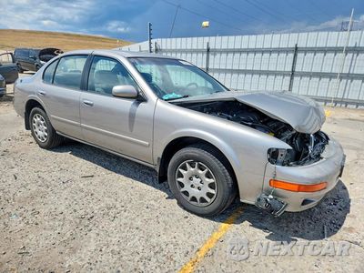Czwarte zdjęcie samochodu z boku: 1999 NISSAN MAXIMA GXE VIN:JN1CA21D9XT821780 - miniatura