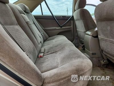 Zdjęcie 10 z 13 samochodu: 2003 TOYOTA CAMRY LE VIN:JTDBE32K530230258 - miniatura