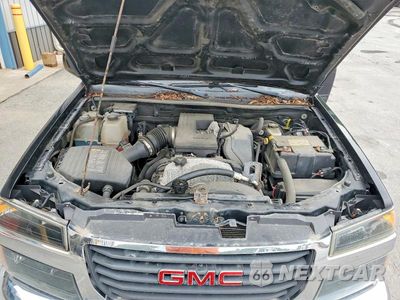 Zdjęcie 11 z 12 samochodu: 2012 GMC CANYON SLE VIN:1GTH6MFE4C8106825 - miniatura