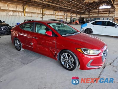 Czwarte zdjęcie samochodu z boku: 2017 HYUNDAI ELANTRA LIMITED VIN:KMHD84LF6HU284039 - miniatura