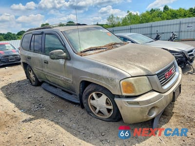 Czwarte zdjęcie samochodu z boku: 2003 GMC ENVOY VIN:1GKDT13S932194147 - miniatura